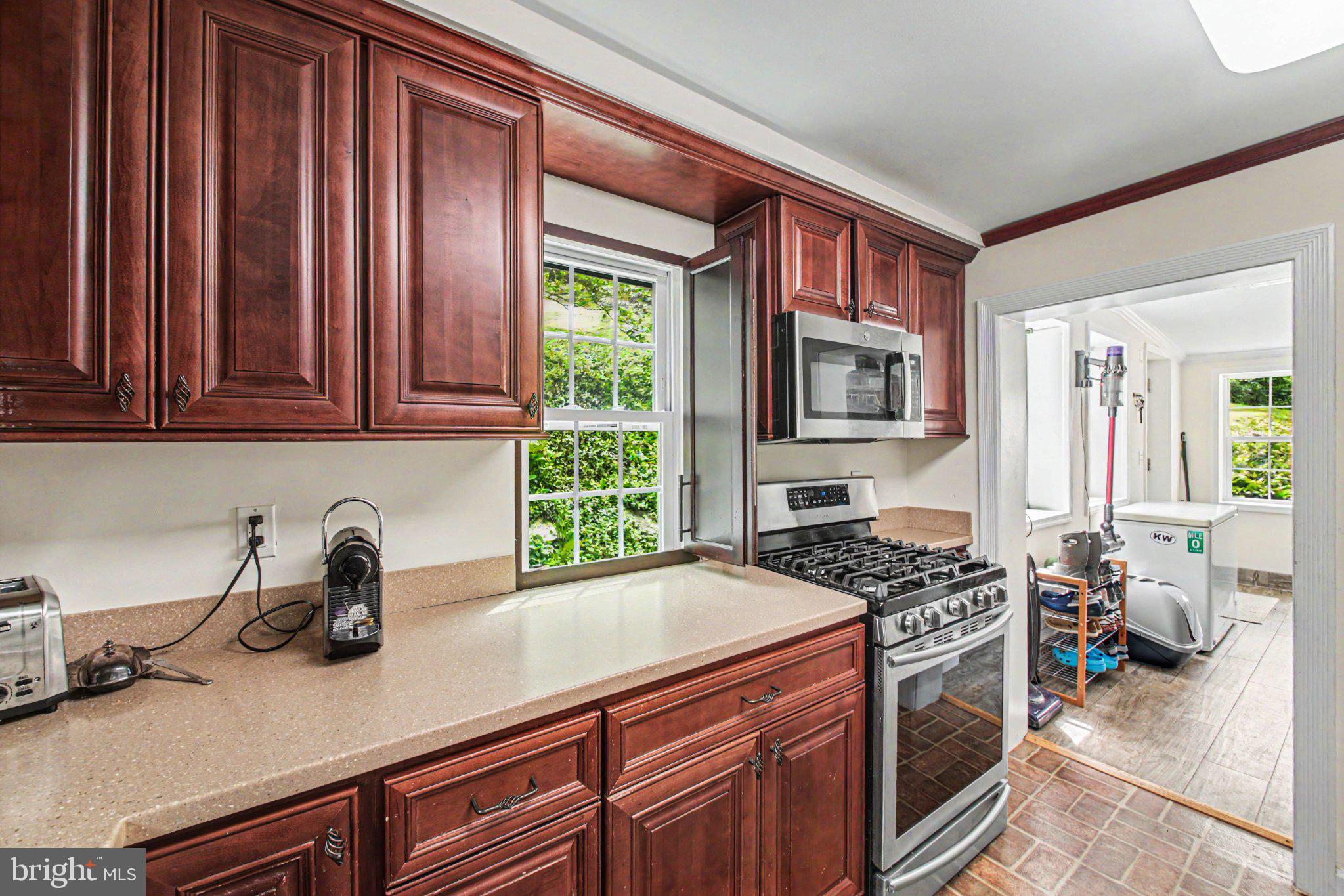 6287 Old Zion Road Warrenton, VA 20187 - Photo 13 of 69 Modern kitchen with rich wood accents.