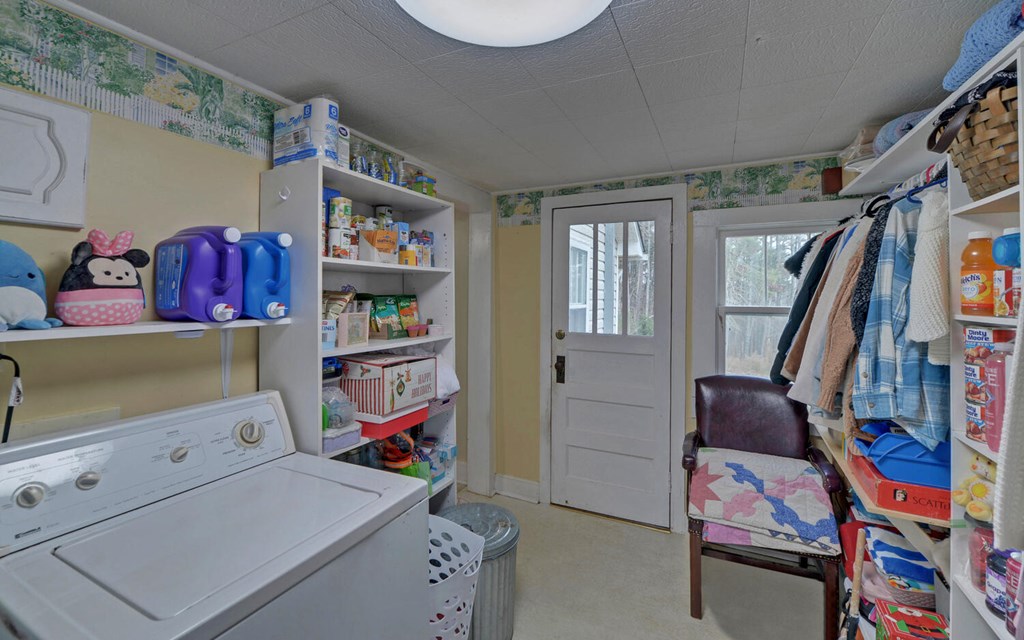 335 Elliott Road Murphy, NC 28906 - Photo 25 of 44 a view of walk in closet with clothes and shoes
