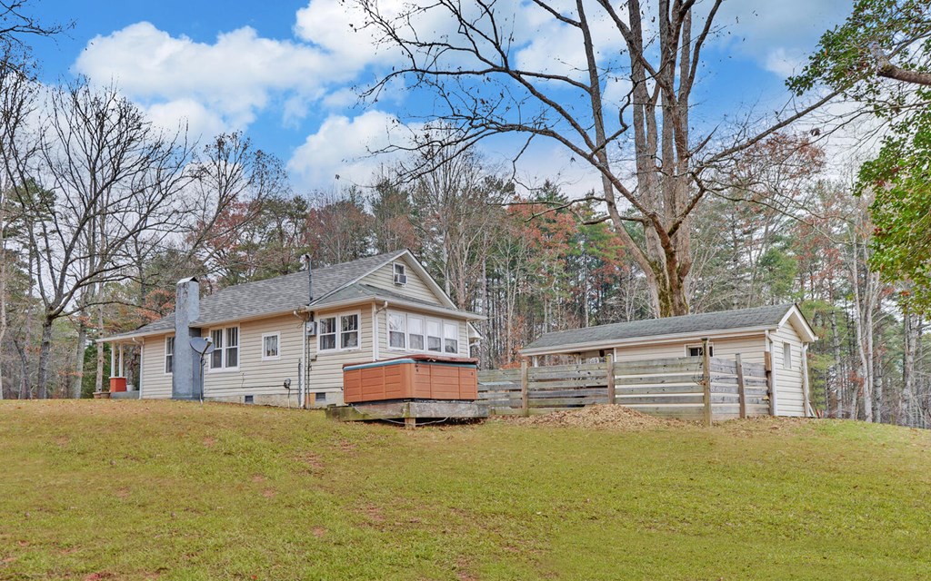 335 Elliott Road Murphy, NC 28906 - Photo 29 of 44 a view of house with outdoor space and swimming pool