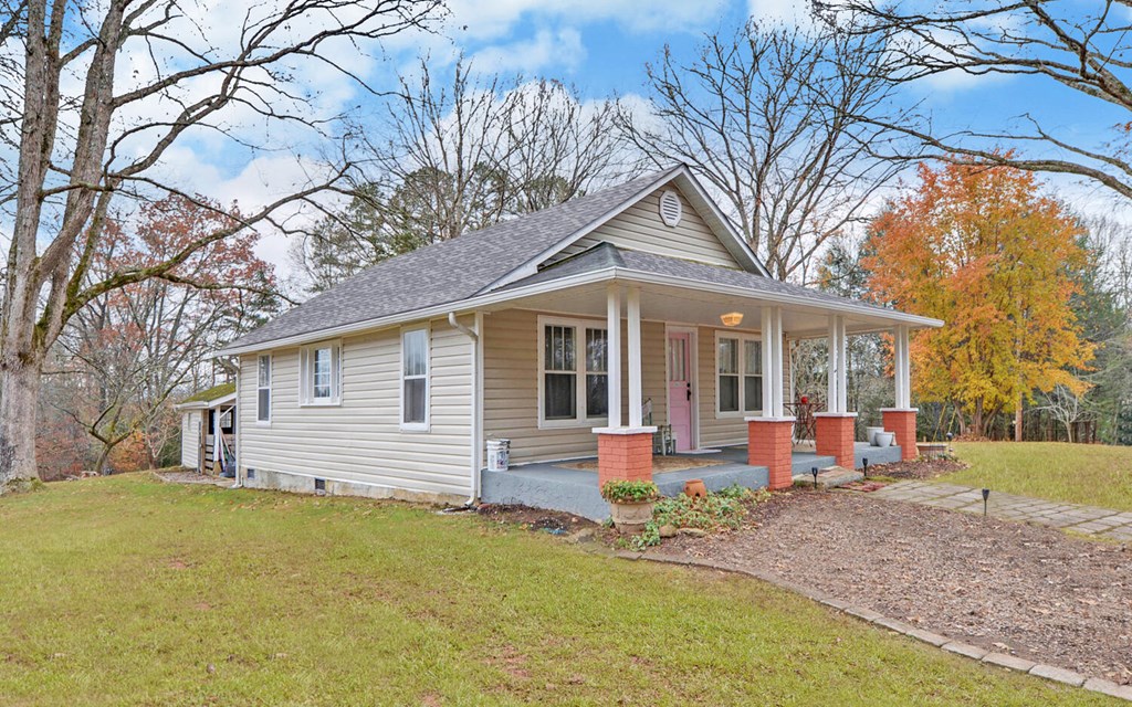 335 Elliott Road Murphy, NC 28906 - Photo 35 of 44 a front view of house with yard and trees around