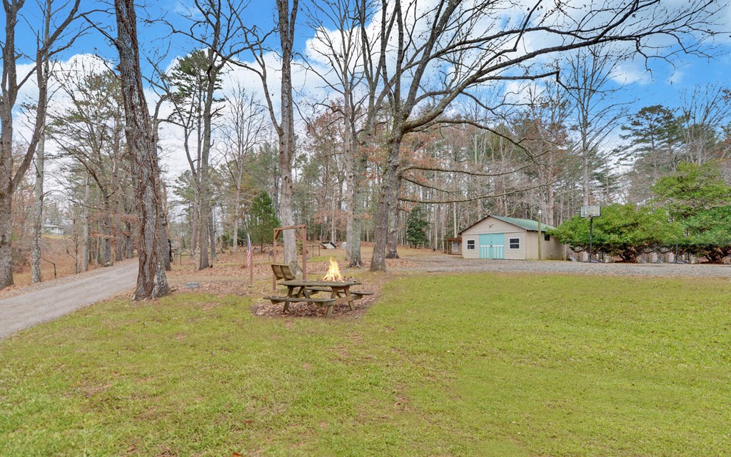 335 Elliott Road Murphy, NC 28906 - Photo 41 of 44 a view of a house with pool and sitting area