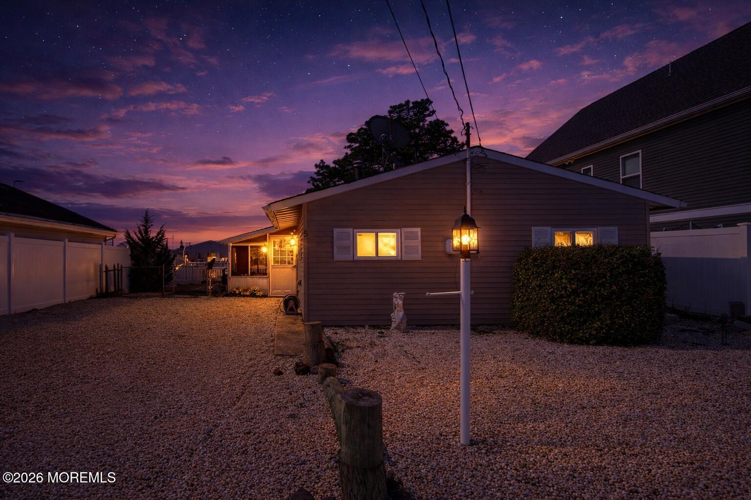 5 West Thames Road Little Egg Harbor, NJ 08087 - Photo 44 of 52 Twilight home with lantern light