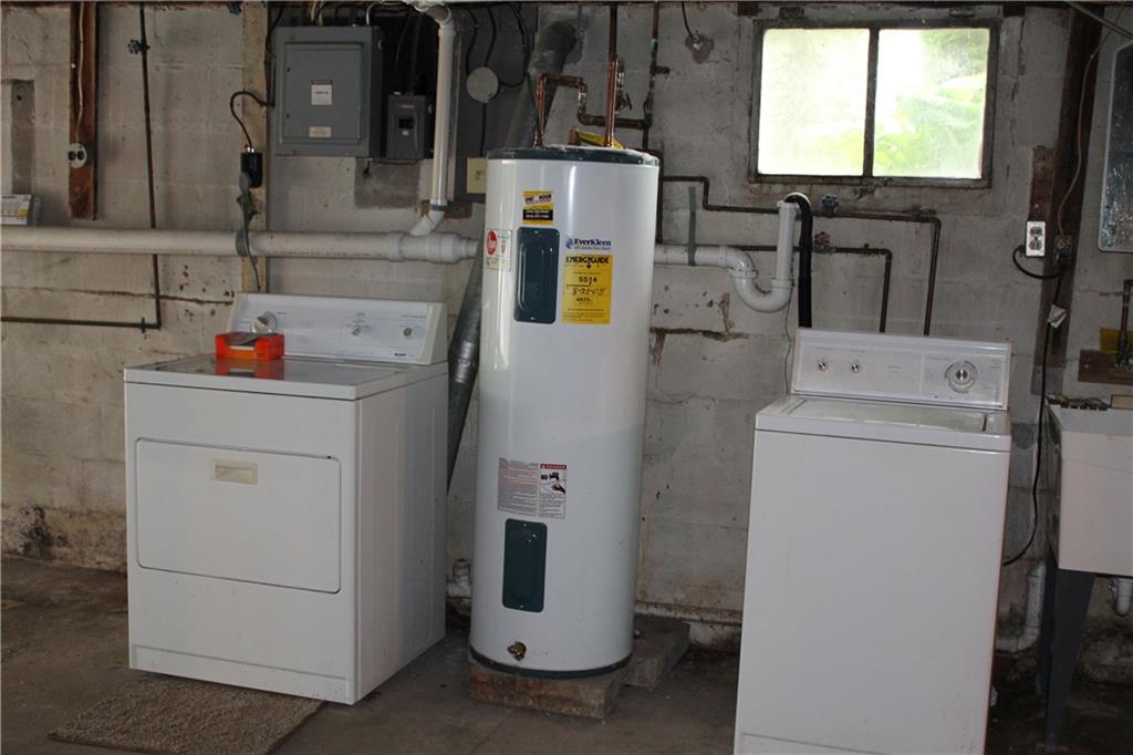 833 Greenville Road Mercer, PA 16137 - Photo 15 of 16 Kenmore Washer & Dryer along with the Water Heater and Utility Sink