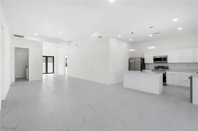 $420,000 | 1247 Kismet Parkway West, Cape Coral, FL 33993