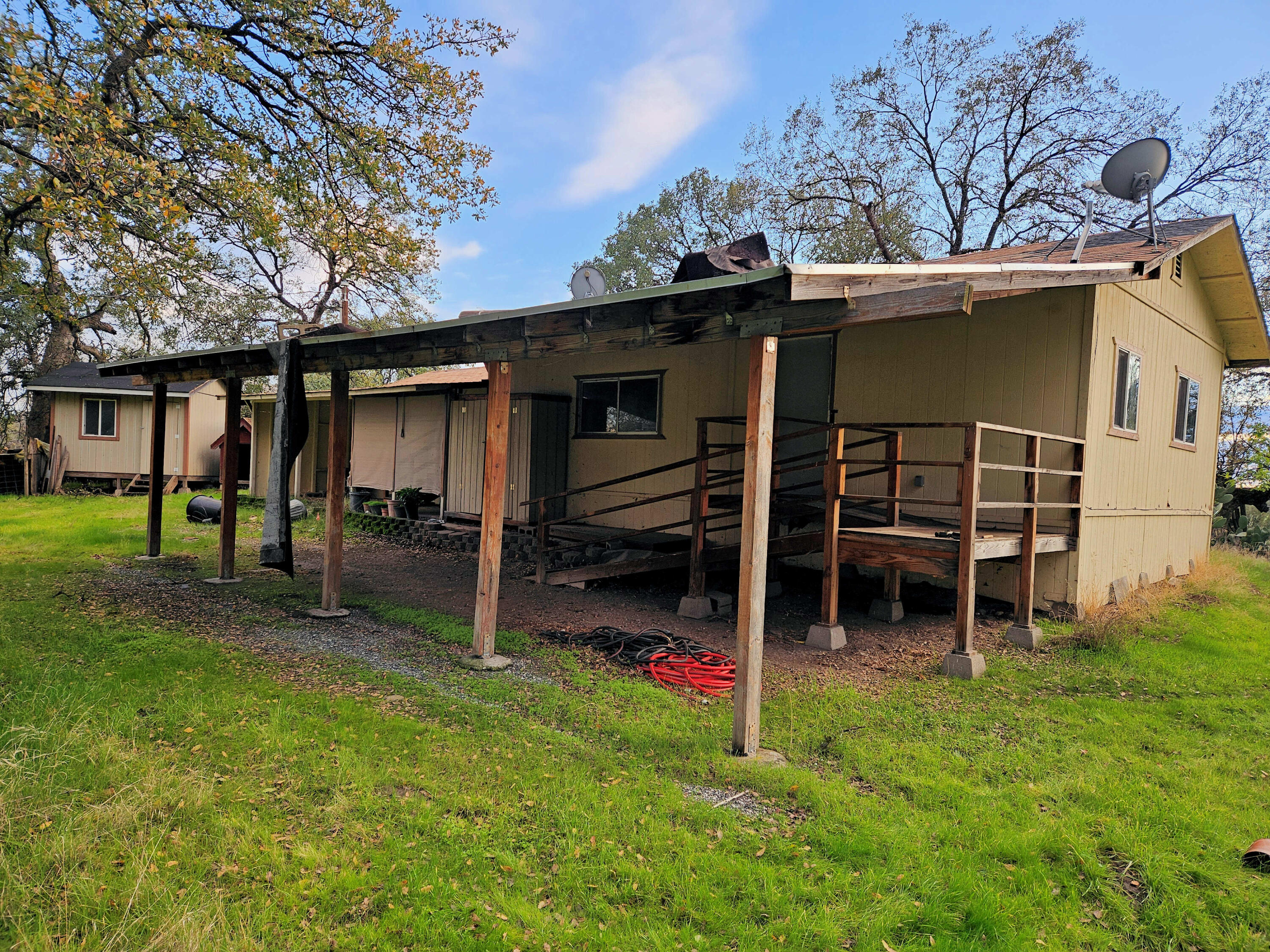 21675 Wildcat Road Shingletown, CA 96088 - Photo 5 of 65 front view of a house with a yard