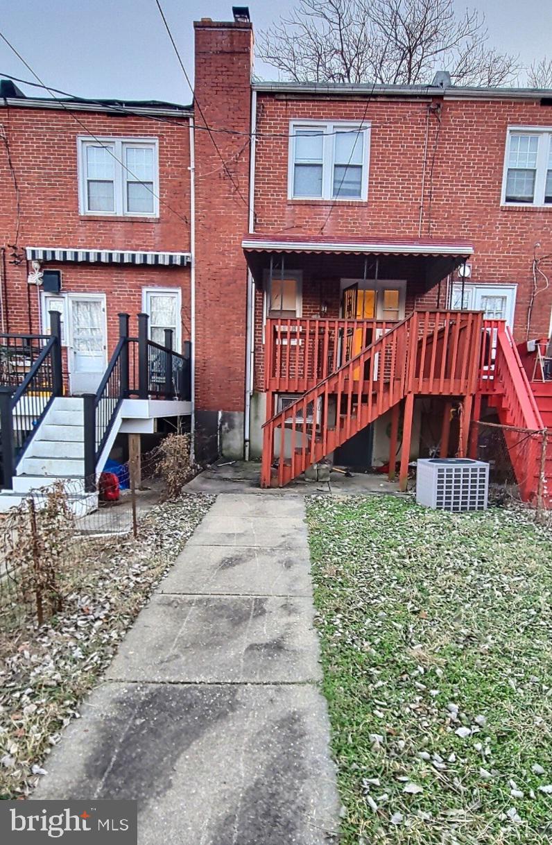 2820 Edgecombe Circle South Baltimore, MD 21215 - Photo 14 of 14 front view of a house with a yard