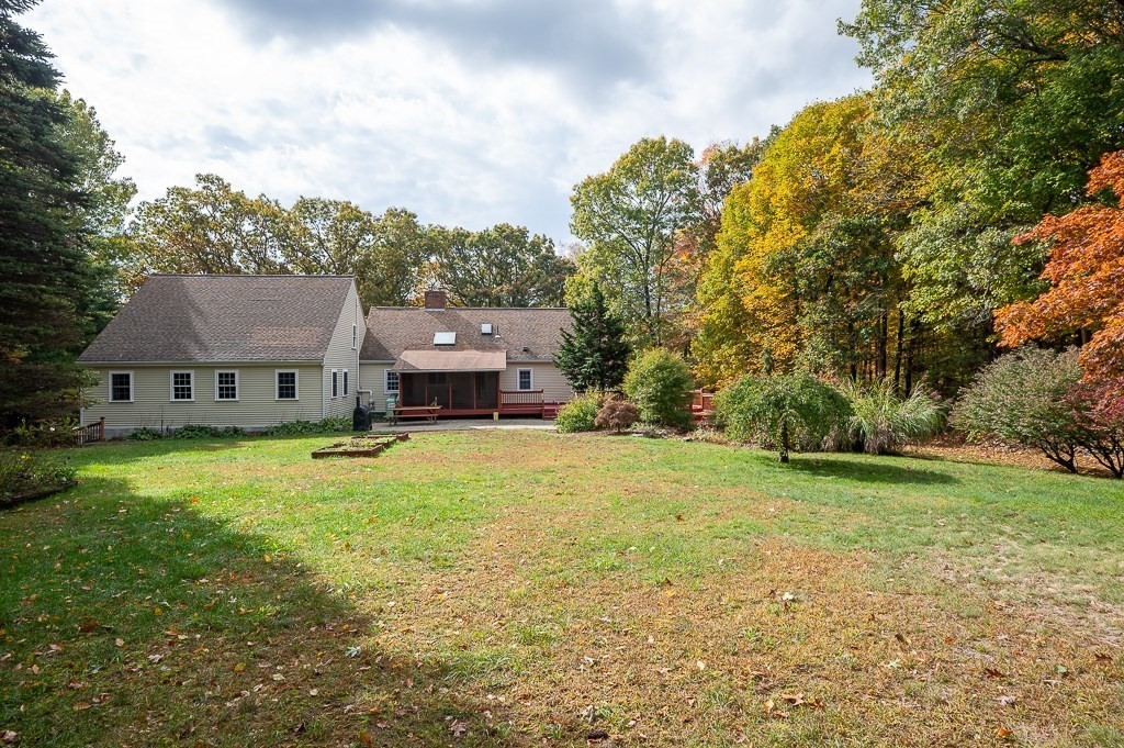 46 Farm Road Bolton, MA 01740 - Photo 1 of 41 a house view with a garden space