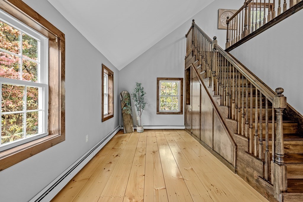 46 Farm Road Bolton, MA 01740 - Photo 20 of 41 a view of an entryway with wooden floor and door