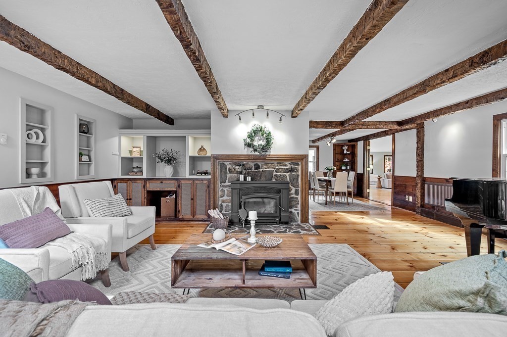 46 Farm Road Bolton, MA 01740 - Photo 3 of 41 a living room with furniture fireplace and a chandelier