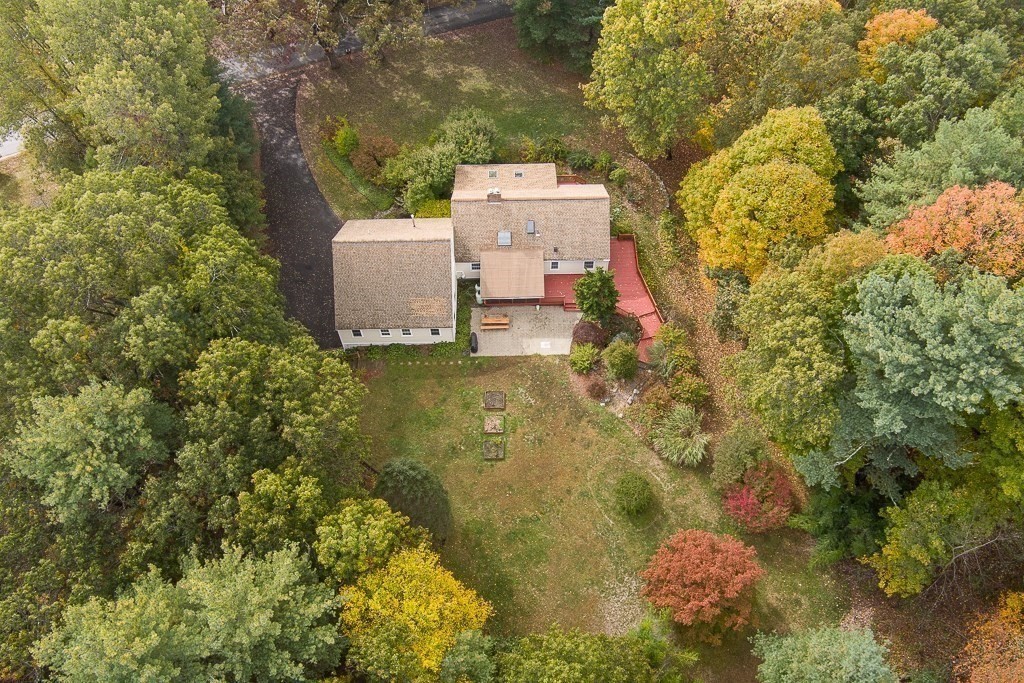 46 Farm Road Bolton, MA 01740 - Photo 38 of 41 an aerial view of a house with a yard