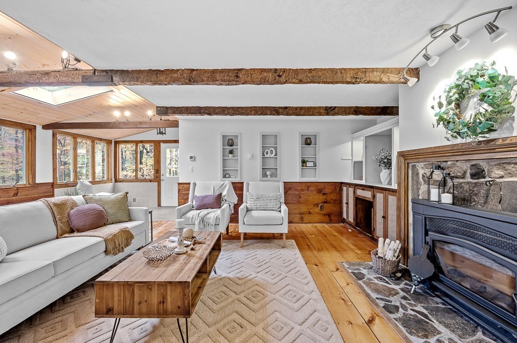 46 Farm Road Bolton, MA 01740 - Photo 4 of 41 a living room with furniture and a rug