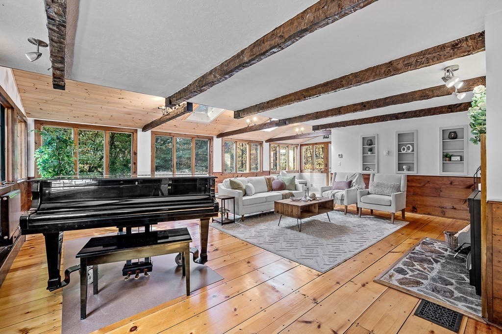 46 Farm Road Bolton, MA 01740 - Photo 5 of 41 a living room with furniture and a piano