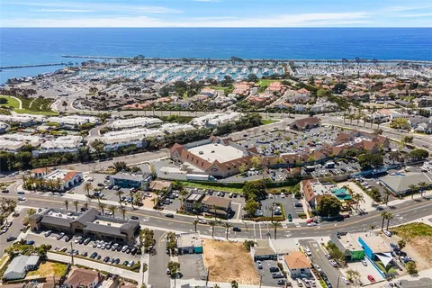 an aerial view of residential building and parking space