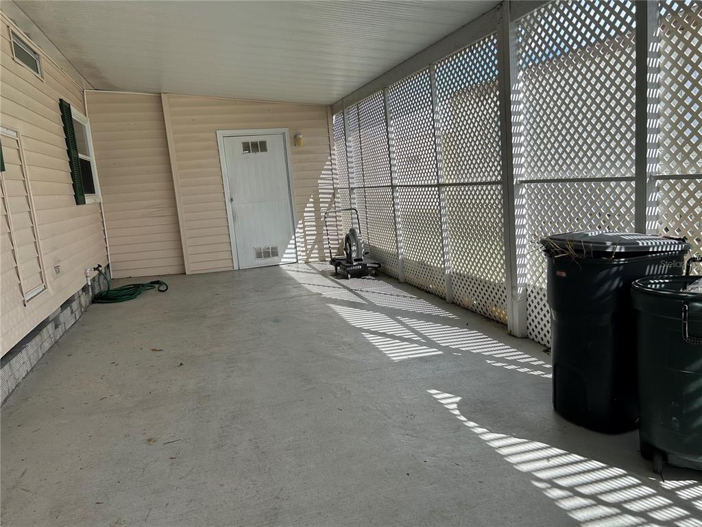 12501 Ulmerton Road, Unit 119 Largo, FL 33774 - Photo 3 of 15 a view of a livingroom with wooden floor