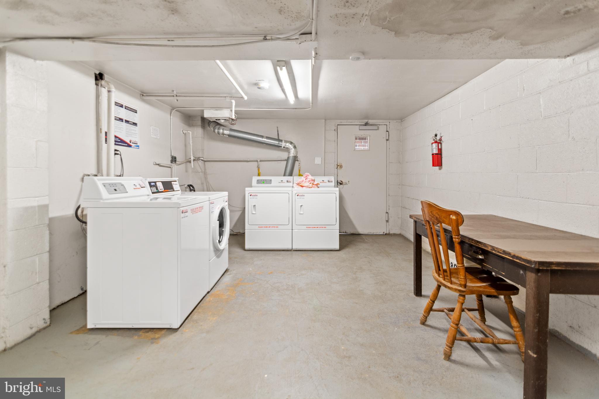 9800 Georgia Avenue, Unit 25301 Silver Spring, MD 20902 - Photo 22 of 22 a utility room with dryer and washer