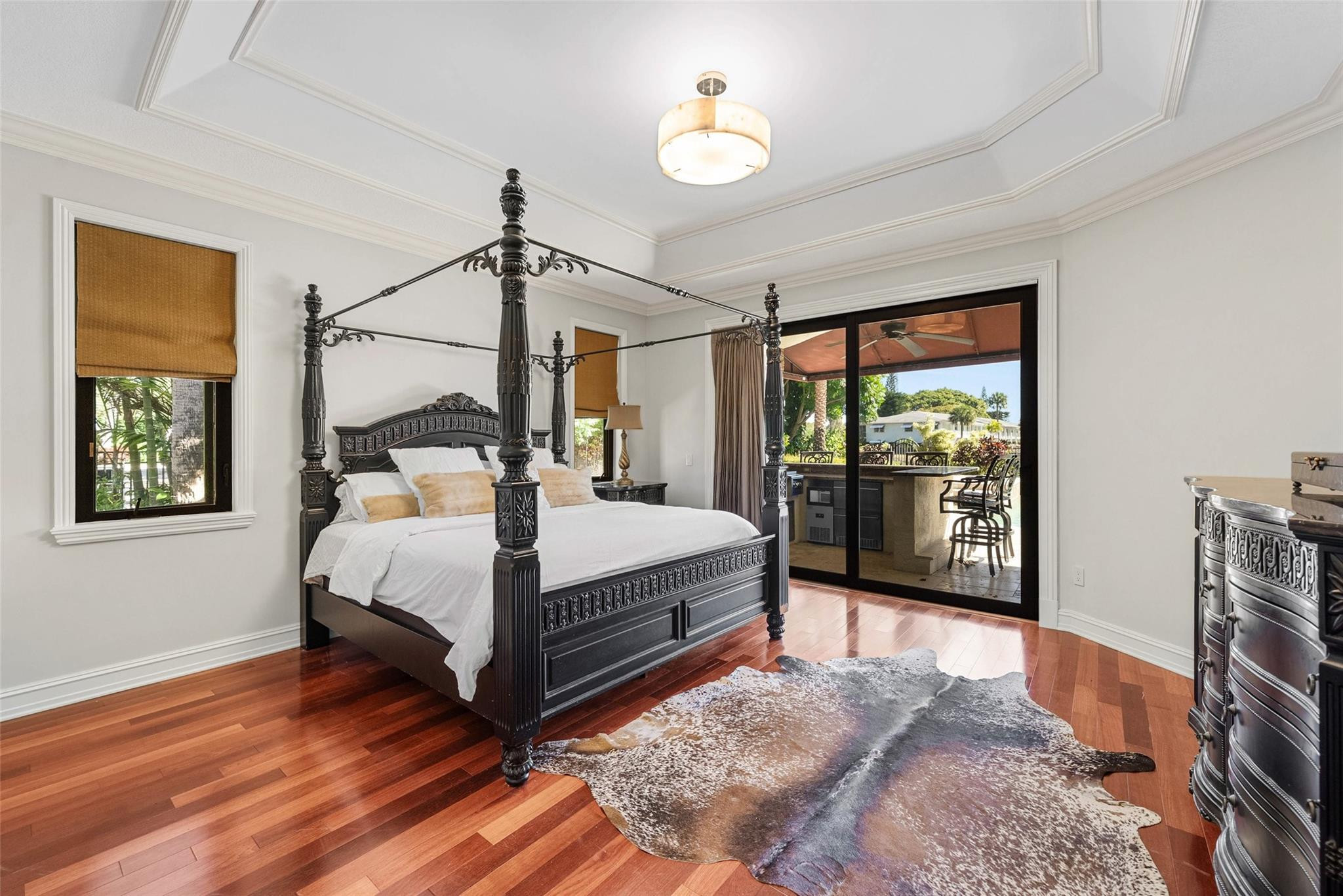 2455 Hampton Bridge Road Delray Beach, FL 33445 - Photo 16 of 46 a bedroom with a bed lamp closet and window