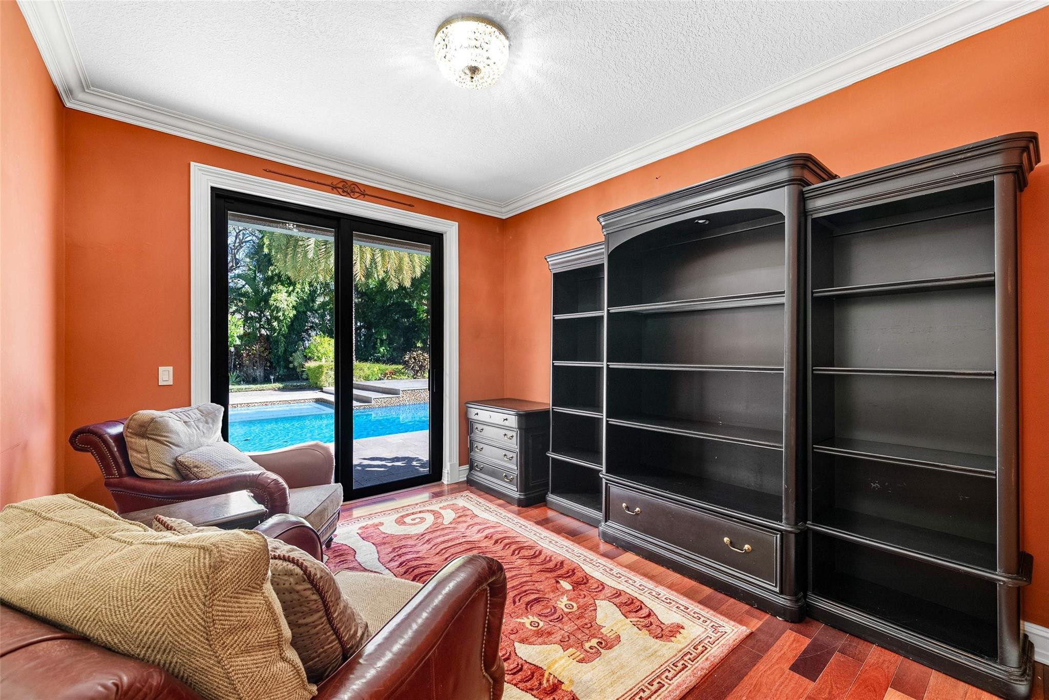 2455 Hampton Bridge Road Delray Beach, FL 33445 - Photo 23 of 46 a bed sitting in a bedroom next to a window