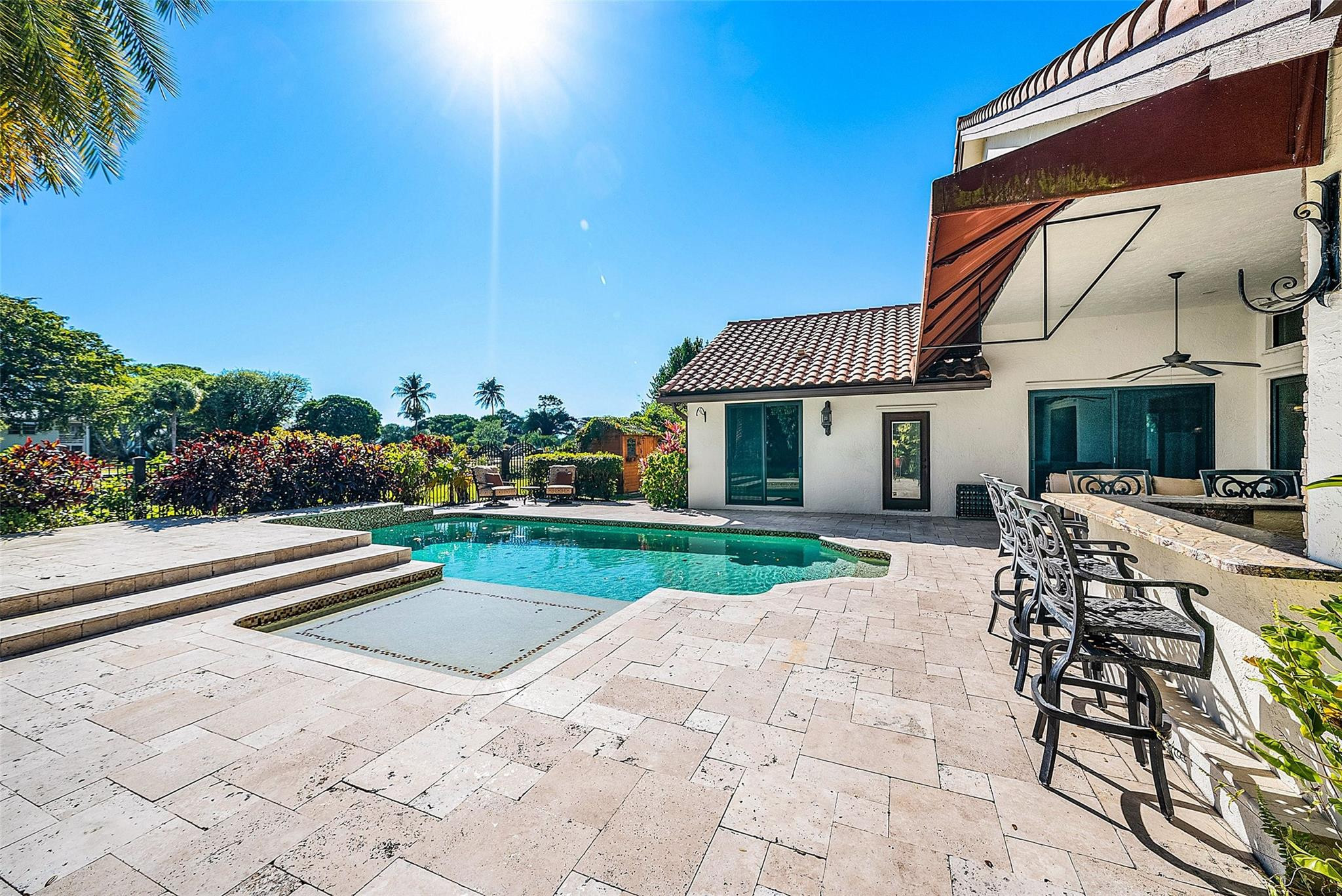2455 Hampton Bridge Road Delray Beach, FL 33445 - Photo 29 of 46 a view of house with yard and outdoor seating