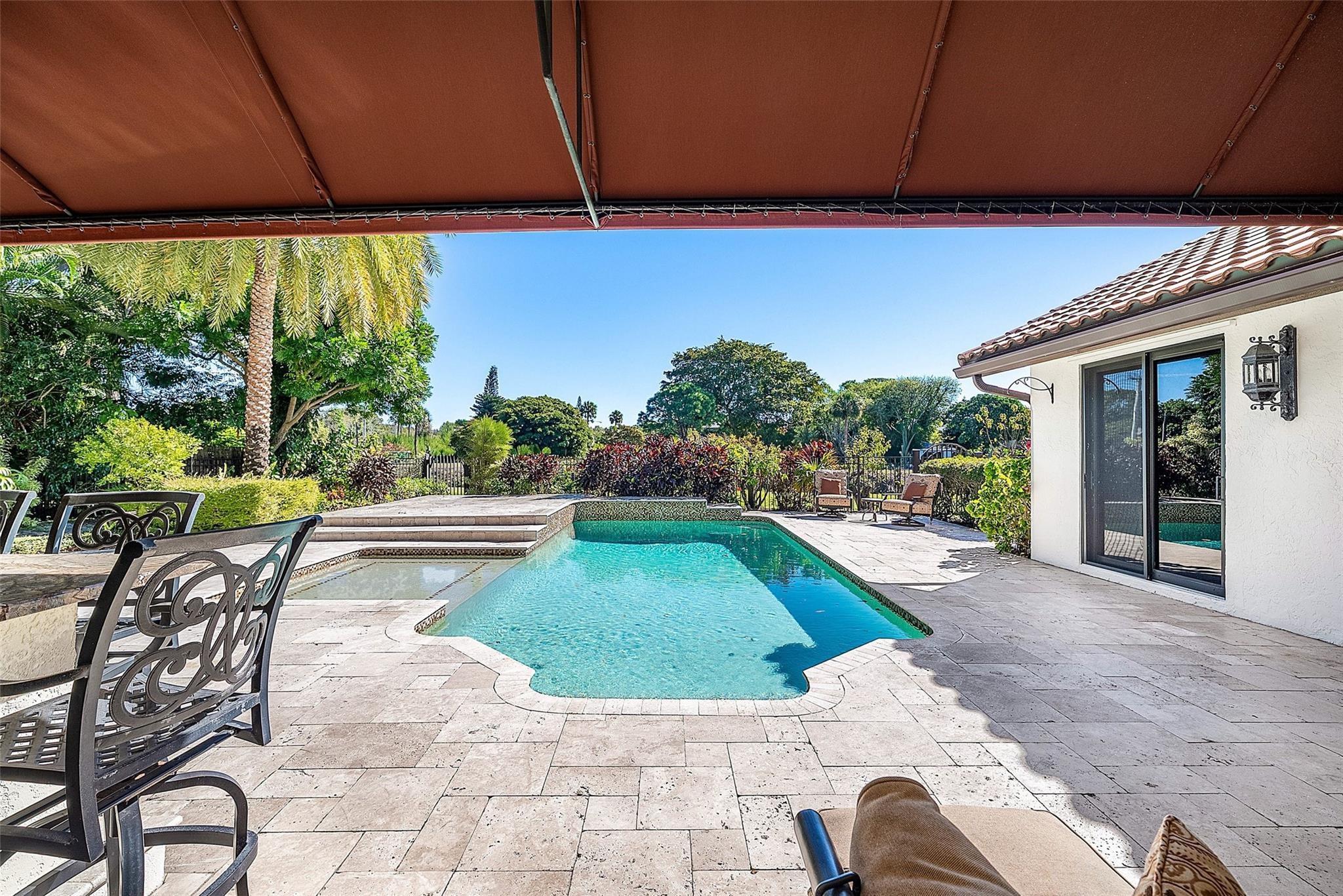 2455 Hampton Bridge Road Delray Beach, FL 33445 - Photo 30 of 46 a view of swimming pool with patio