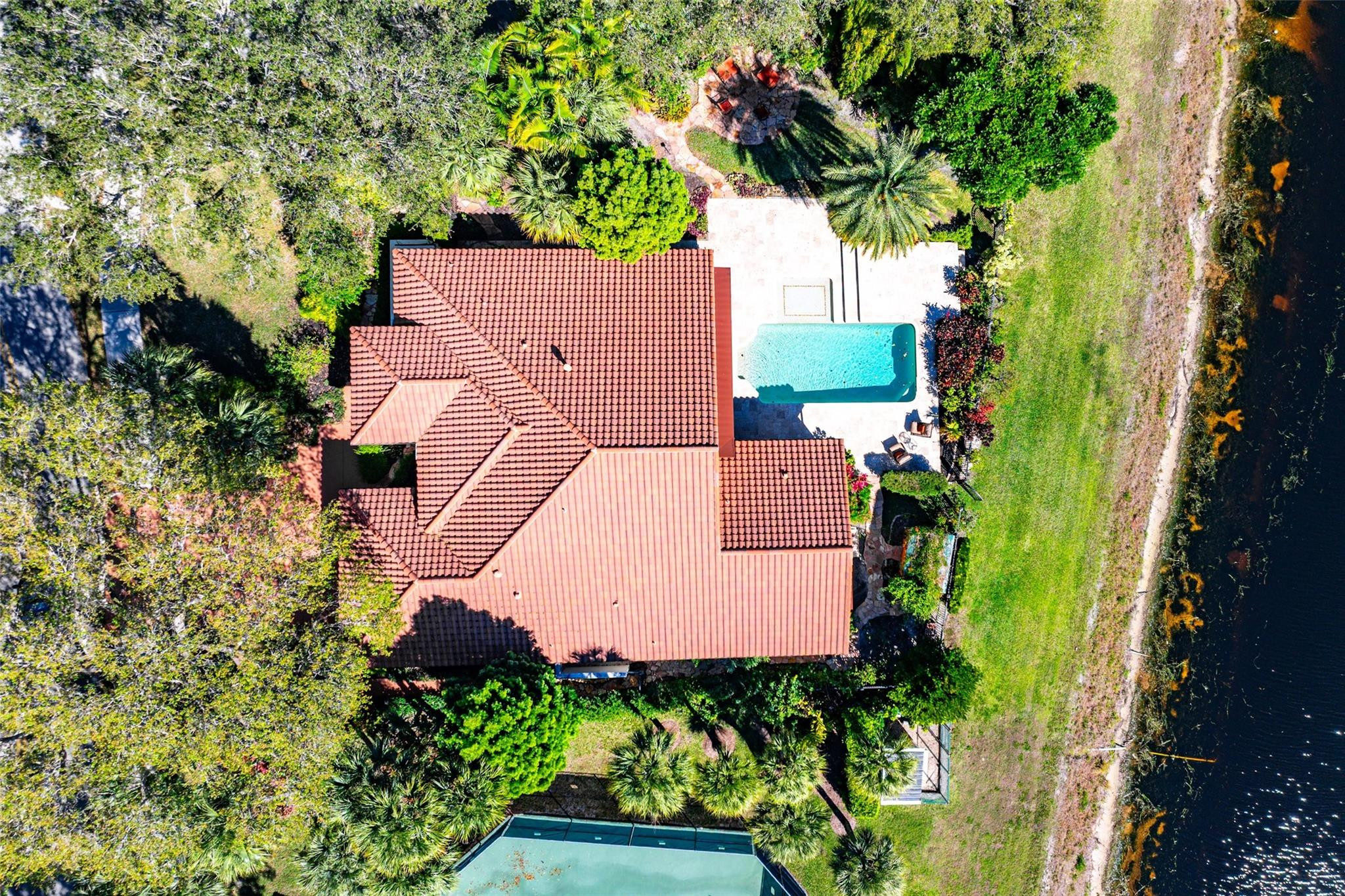 2455 Hampton Bridge Road Delray Beach, FL 33445 - Photo 41 of 46 an aerial view of a house with a garden
