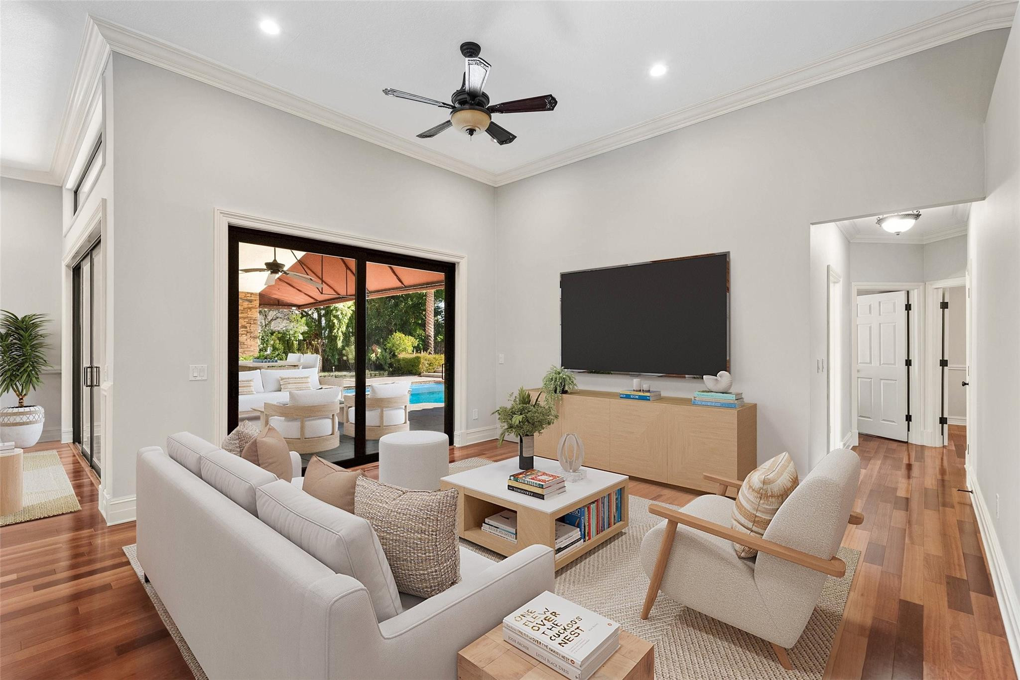 2455 Hampton Bridge Road Delray Beach, FL 33445 - Photo 8 of 46 a living room with furniture and a flat screen tv