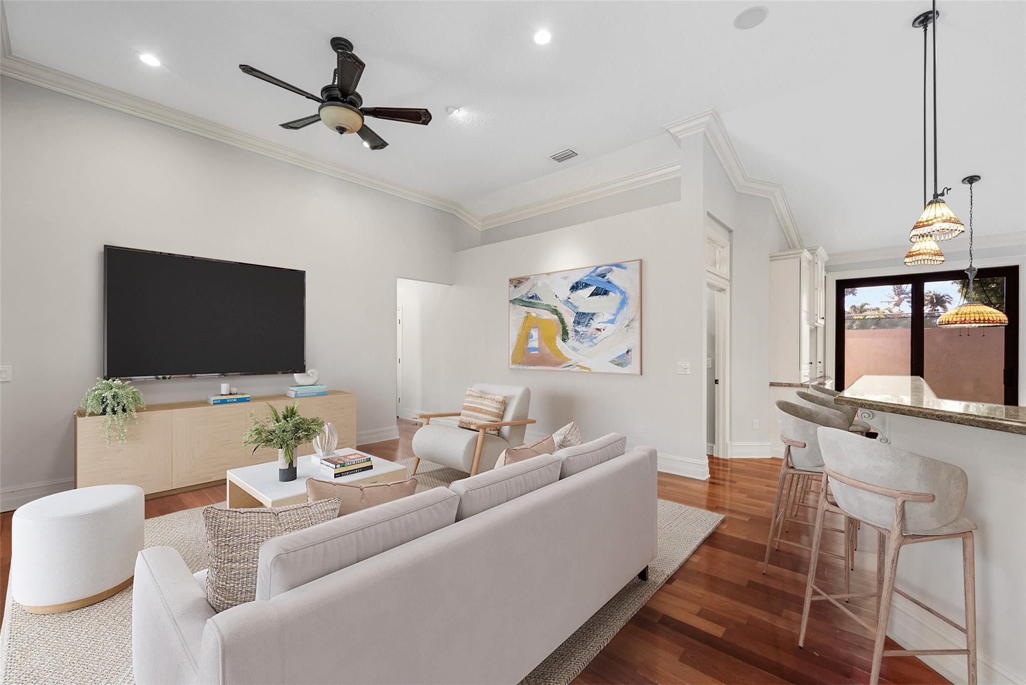 2455 Hampton Bridge Road Delray Beach, FL 33445 - Photo 9 of 46 a living room with furniture and a flat screen tv
