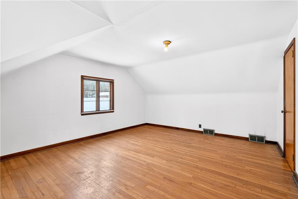 746 McNeilly Road Pittsburgh, PA 15226 - Photo 23 of 47 an empty room with wooden floor and windows