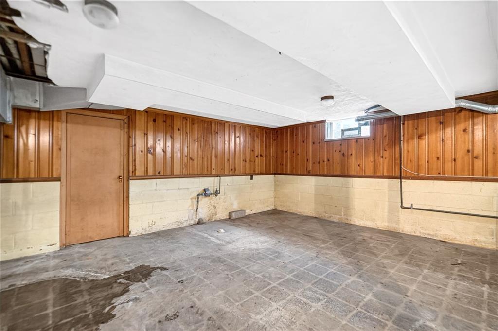 746 McNeilly Road Pittsburgh, PA 15226 - Photo 29 of 47 a view of an empty room with wooden floor