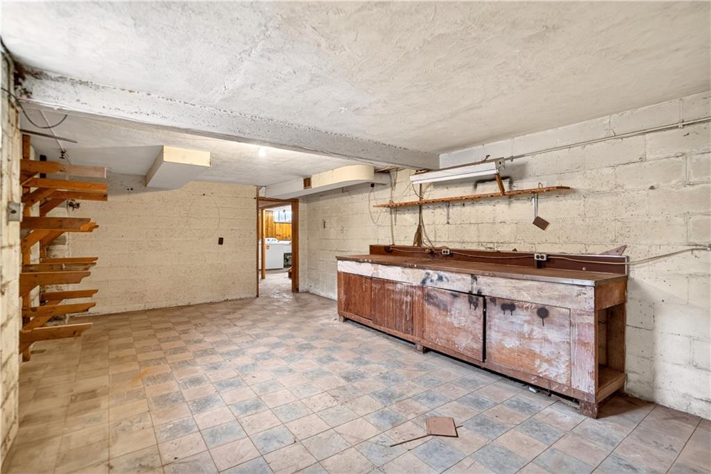 746 McNeilly Road Pittsburgh, PA 15226 - Photo 36 of 47 a large white kitchen with granite countertop a sink