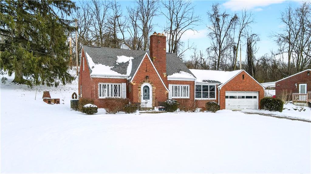 746 McNeilly Road Pittsburgh, PA 15226 - Photo 41 of 47 a front view of a house with a yard covered in snow