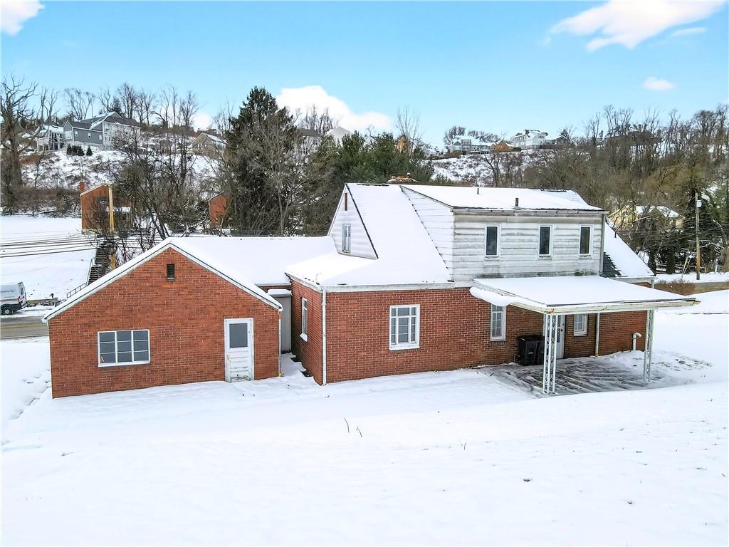 746 McNeilly Road Pittsburgh, PA 15226 - Photo 43 of 47 a front view of a house with a yard