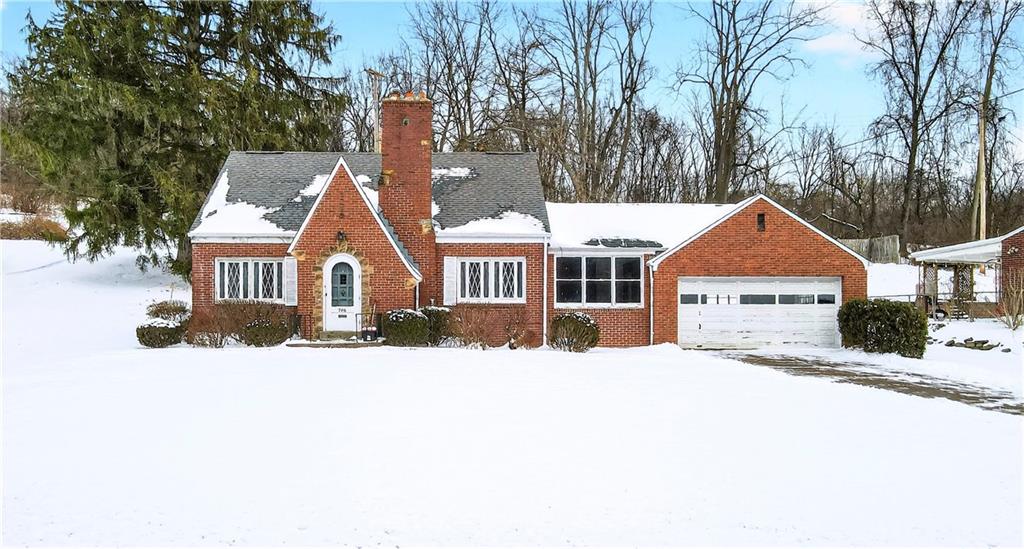 746 McNeilly Road Pittsburgh, PA 15226 - Photo 47 of 47 a front view of a house with a yard covered in snow