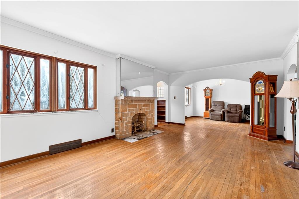 746 McNeilly Road Pittsburgh, PA 15226 - Photo 8 of 47 a view of livingroom with furniture and a fireplace