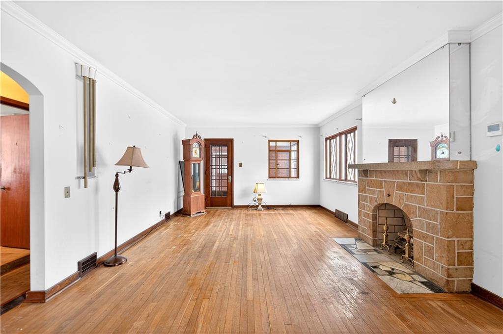 746 McNeilly Road Pittsburgh, PA 15226 - Photo 9 of 47 a view of livingroom with hardwood floor and a fireplace