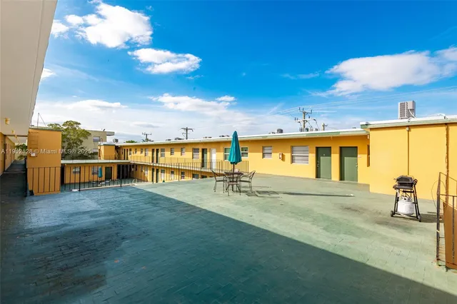 a view of a house with a swimming pool