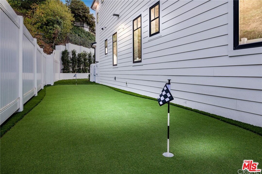 16656 Oldham Street Encino, CA 91436 - Photo 42 of 46 a view of a backyard