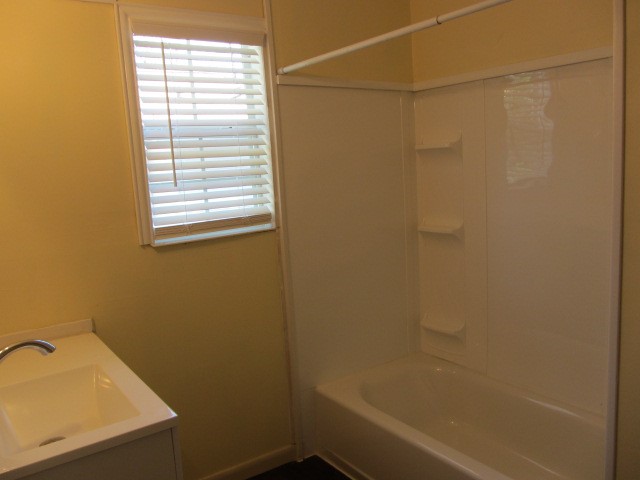 1310 16th Street Huntsville, TX 77340 - Photo 12 of 21 bathroom in Primary bedrm