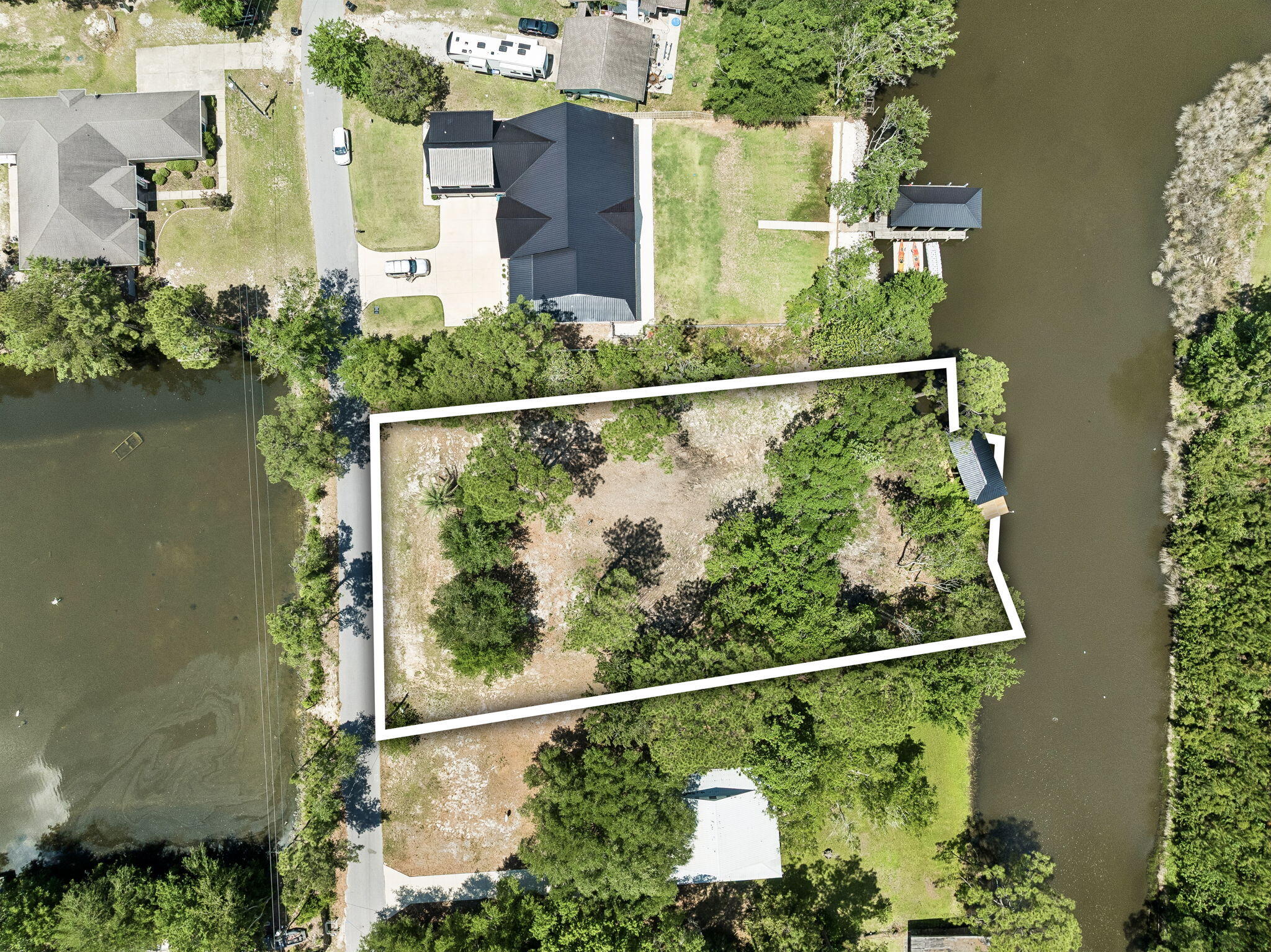 92 Waterside Lane Freeport, FL 32439 - Photo 5 of 28 an aerial view of a house with a garden