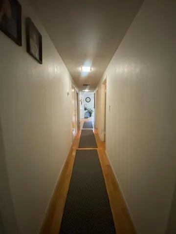 a bed room with a bed and a desk