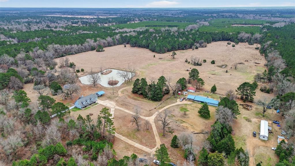 720 Haggerty Road Karnack, TX 75661 - Photo 35 of 39 an aerial view of a house with a yard