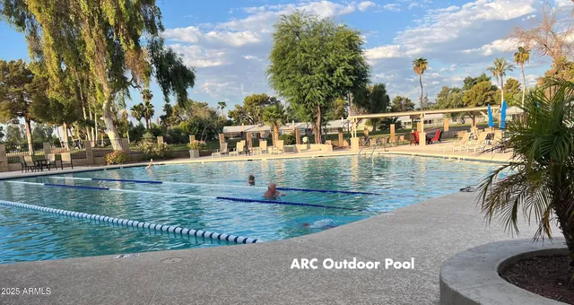 a view of a swimming pool with an outdoor space