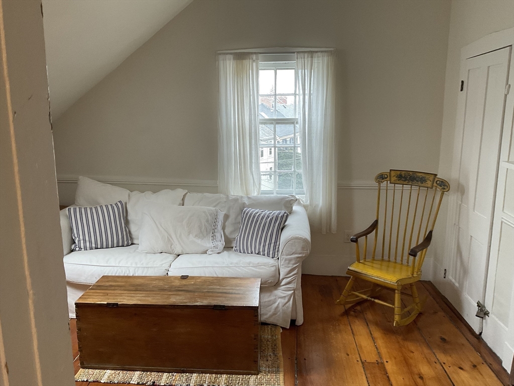 1 Middle Street, Unit 3 Marblehead, MA 01945 - Photo 4 of 16 a living room with a couch and a table