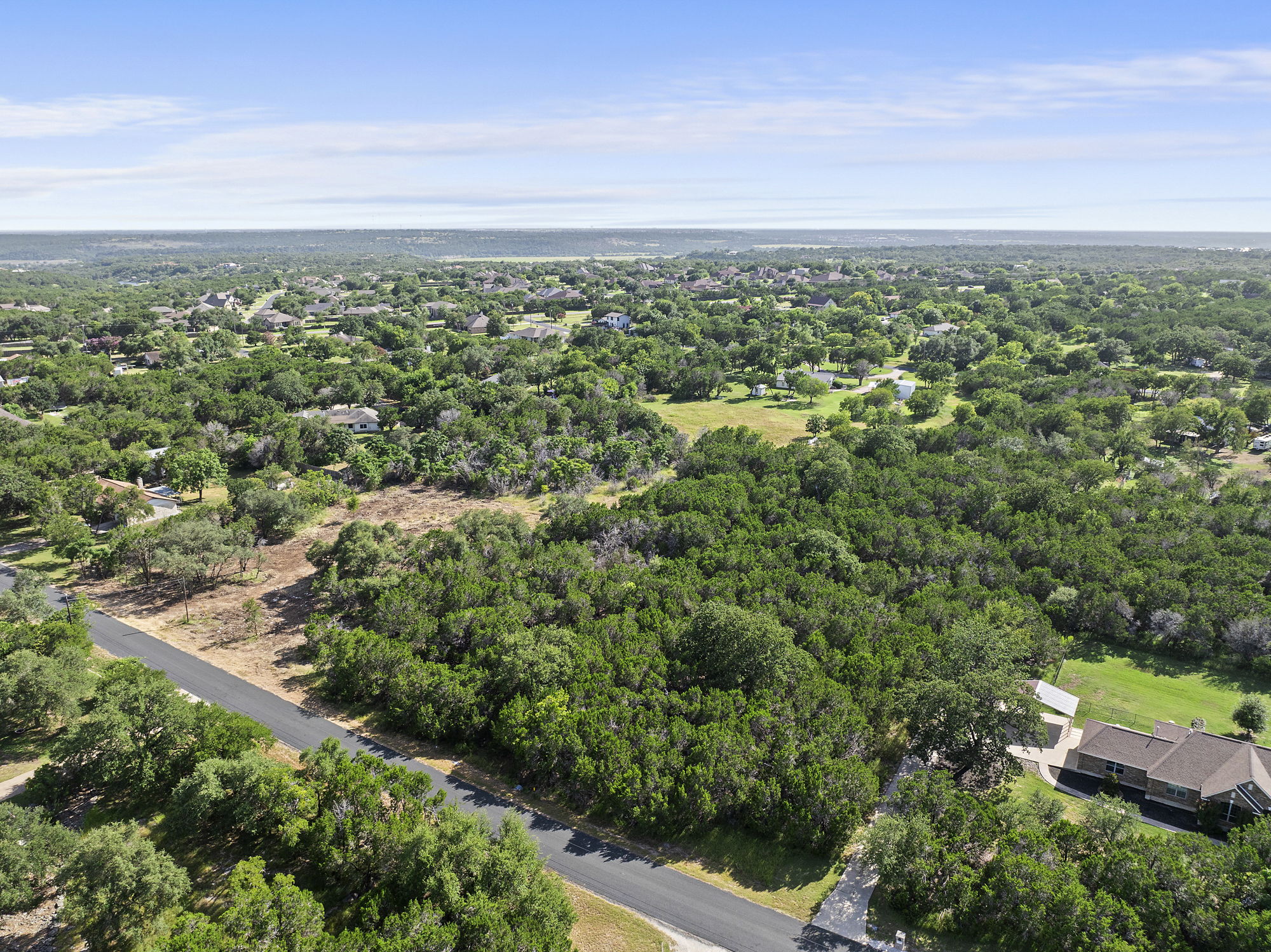 Aerial view of a heavily wooded area