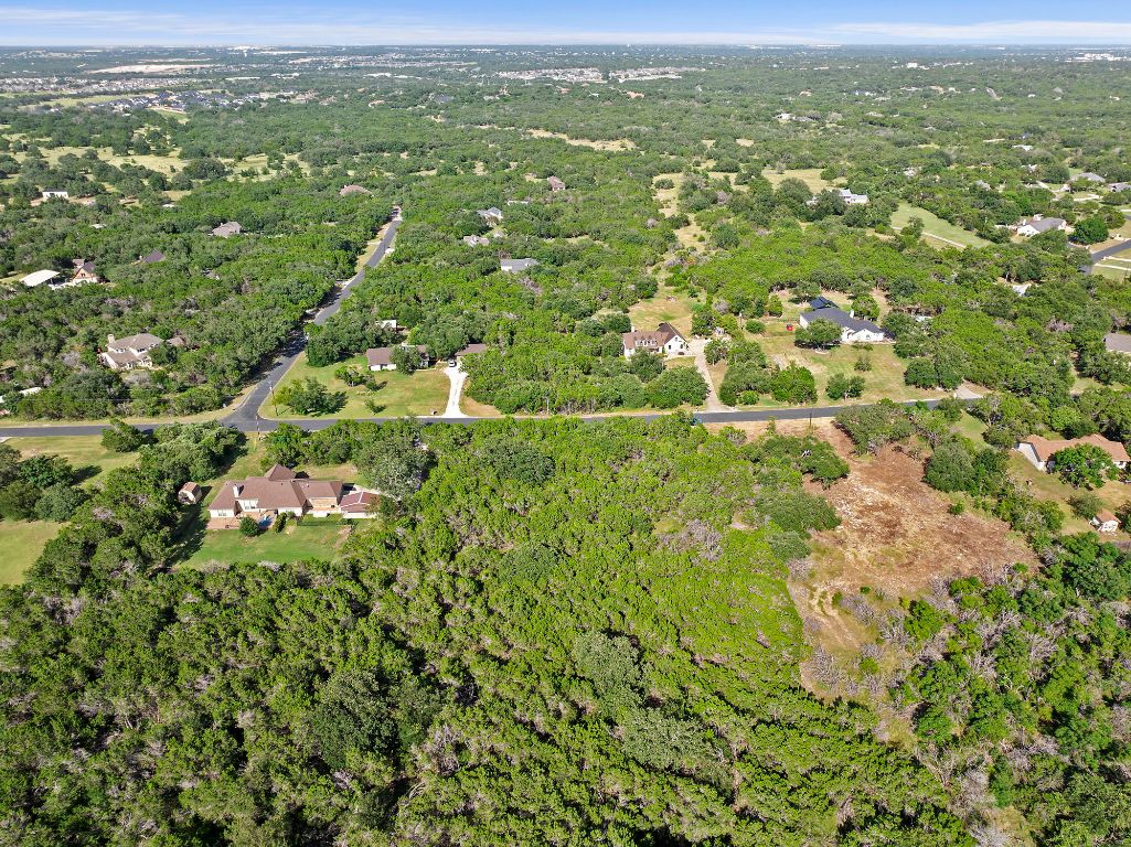 120 Council Road Georgetown, TX 78633 - Photo 7 of 9 an aerial view of residential houses with outdoor space and trees