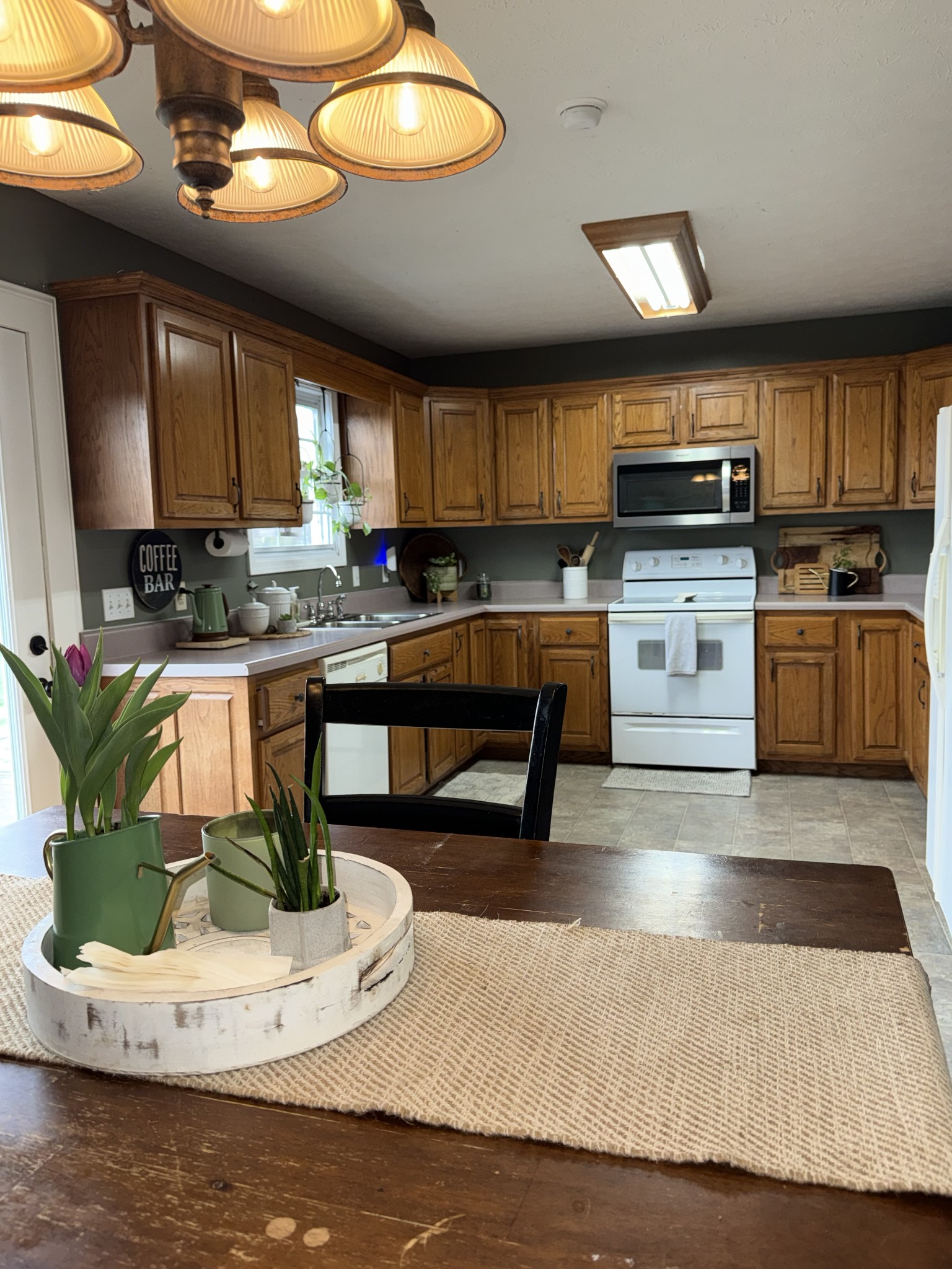 144 B Leo Carter Road Bethpage, TN 37022 - Photo 6 of 34 a kitchen with a sink appliances and cabinets