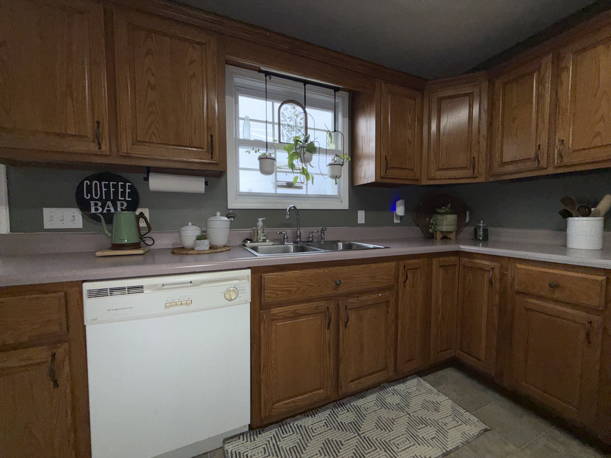 144 B Leo Carter Road Bethpage, TN 37022 - Photo 8 of 34 a kitchen with granite countertop wooden cabinets stainless steel appliances a sink and window