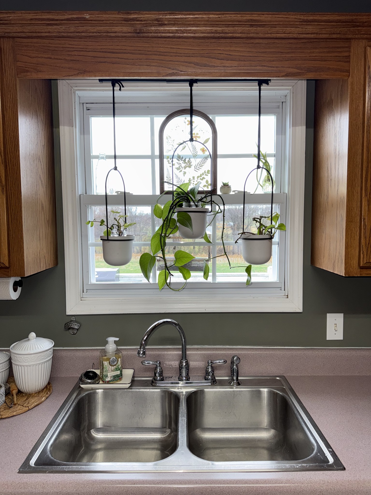 144 B Leo Carter Road Bethpage, TN 37022 - Photo 9 of 34 a kitchen sink with a granite countertop window sink and cabinets