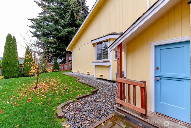 a backyard of a house with lots of green space