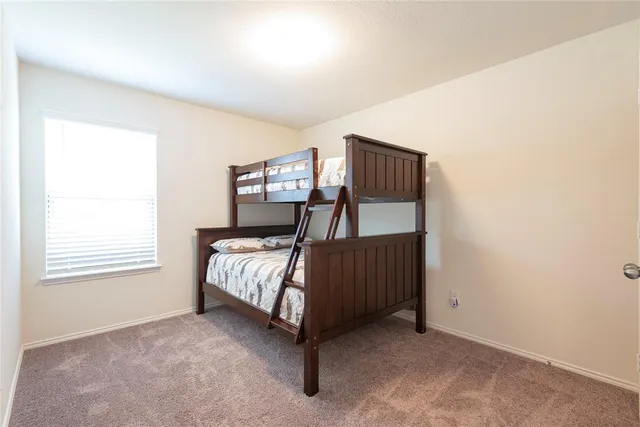 a bathroom with a sink a toilet and a bathtub