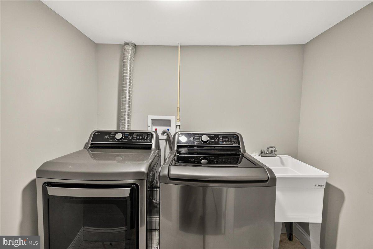 2683 Walston Road Mount Airy, MD 21771 - Photo 40 of 62 Modern laundry space with sleek appliances.
